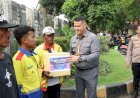 Sespimmen-Polri-Dikreg-ke-65-Gelar-Baksos-di-Terminal-GSN-Tanjung-Perak,-Sasar-TKBM-dan-Pengemudi-Bentor